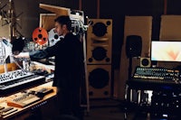 a man working in a recording studio